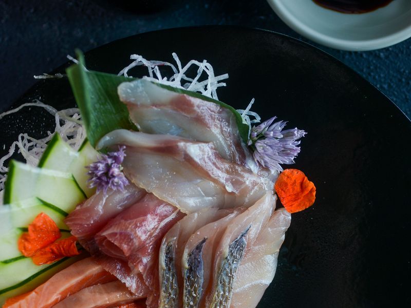 Aerial sashimi plate with soy sauce at Harakiri de Una